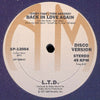L.T.D. : We Party Hearty / (Every Time I Turn Around) Back In Love Again (12", Ter)